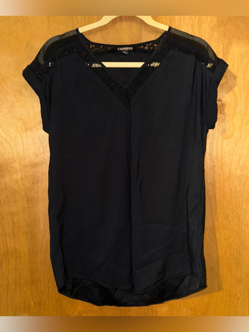 Medium Express Woman’s Black Short Sleeved Blouse